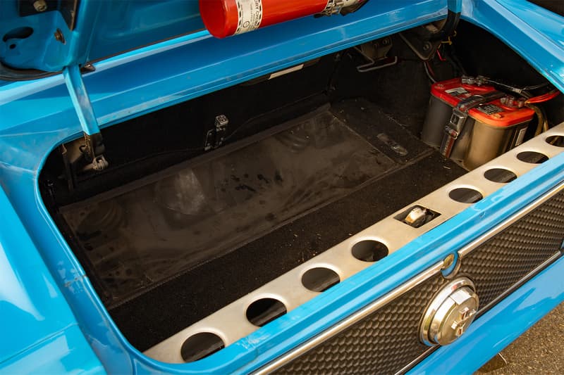 A glass cut away inside the trunk to showcase the rear suspension design of the Mach 1
