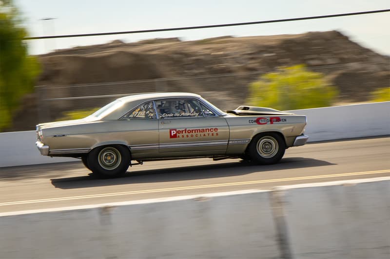 A vintage Ford Fairlane powering down the 1/8th mile