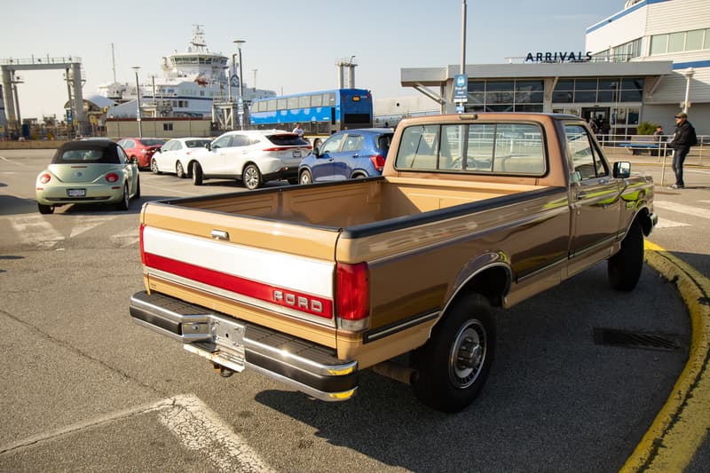 Rear photo of 1988 Ford F-250 with the ferry it arrived on in background