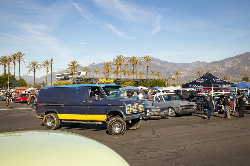 A lifted Ford Econoline was seen touring the aisles looking for parking