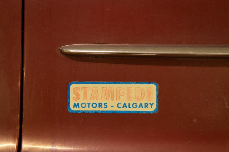 The original Stampede Motors decal on the tailgate