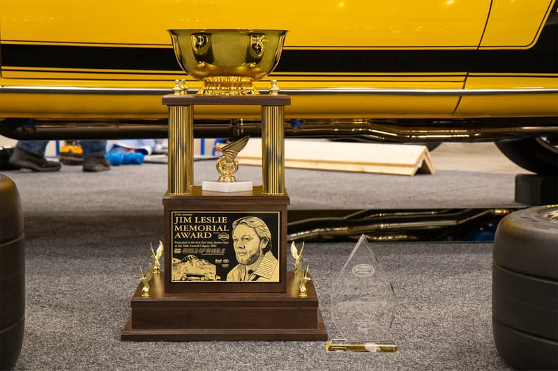The Jim Leslie Memorial Award sitting alongside the award winning 1969 Ford Mustang