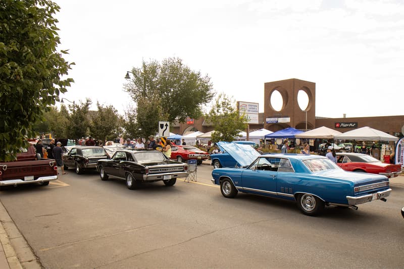 A trio of Beaumont's parked down the centre of the street