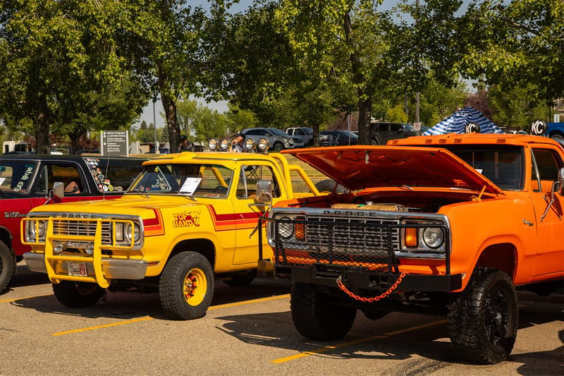 A pair of Dodge W-Series trucks, including the mentioned "Top Hand" special edition W-100